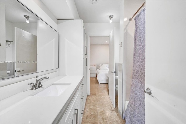 2817 NE 26th St, Fort Lauderdale, FL 33305 - full bath with vanity, curtained shower, tile patterned flooring, ensuite bathroom, and toilet
