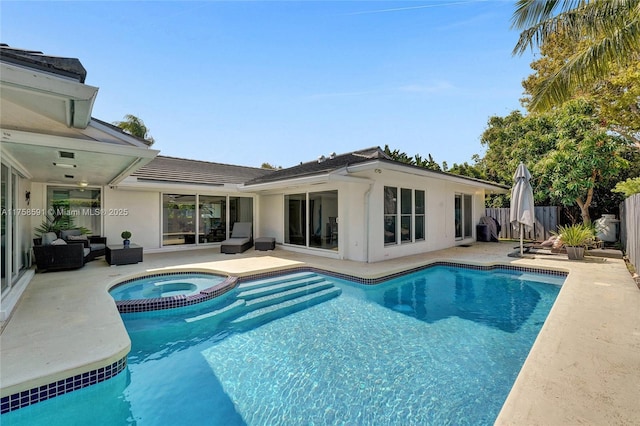 2817 NE 26th St, Fort Lauderdale, FL 33305 - view of pool with a pool with connected hot tub, a patio area, a fenced backyard, and an outdoor hangout area