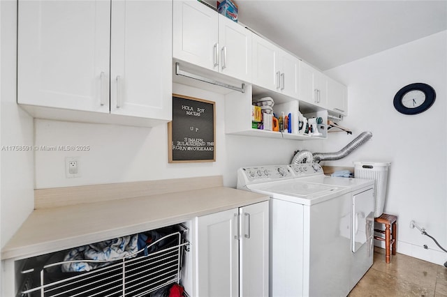 laundry area featuring cabinet space and independent washer and dryer