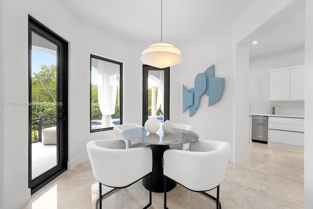 dining area featuring recessed lighting