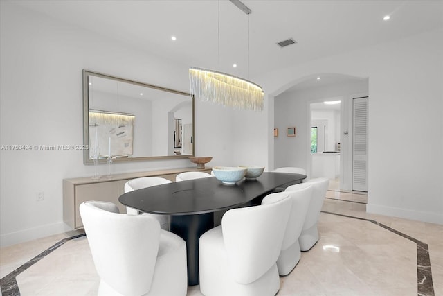 dining area featuring recessed lighting, baseboards, and visible vents