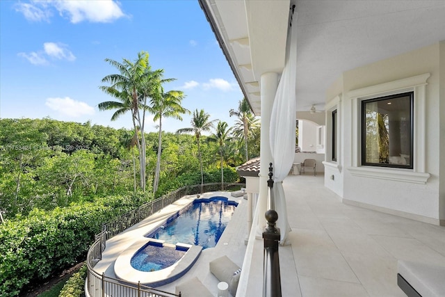 view of pool featuring a patio area