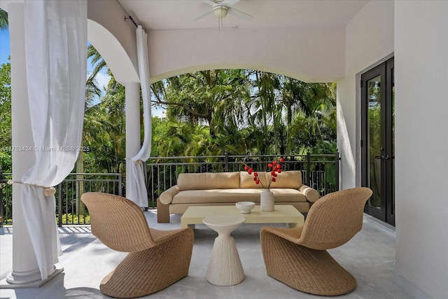 view of patio featuring a balcony and a ceiling fan