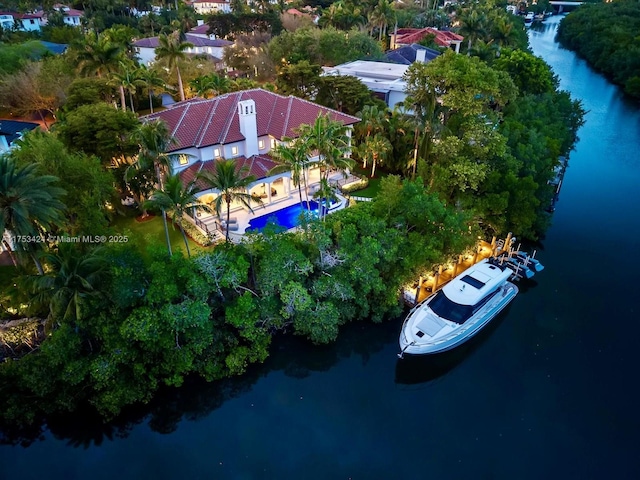 bird's eye view with a water view