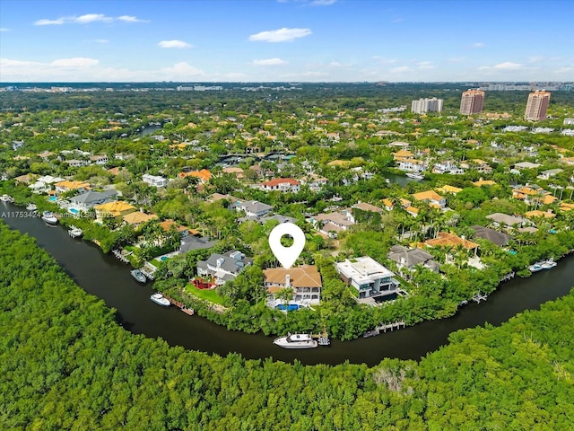 bird's eye view featuring a water view and a residential view