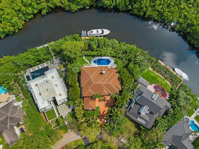 drone / aerial view with a water view