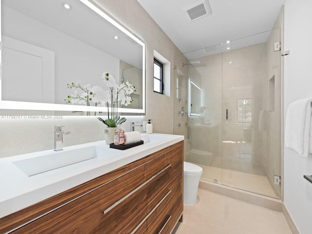 full bath featuring a shower stall, vanity, visible vents, recessed lighting, and toilet