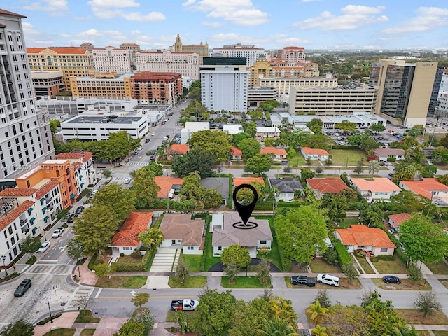 birds eye view of property featuring a city view