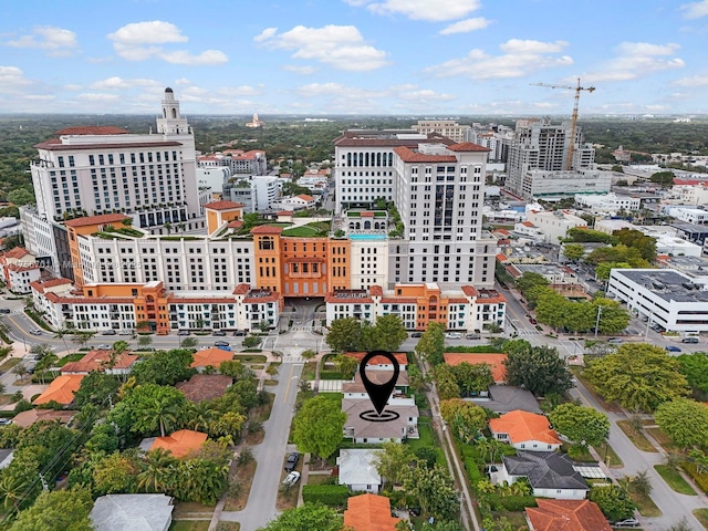 birds eye view of property featuring a city view