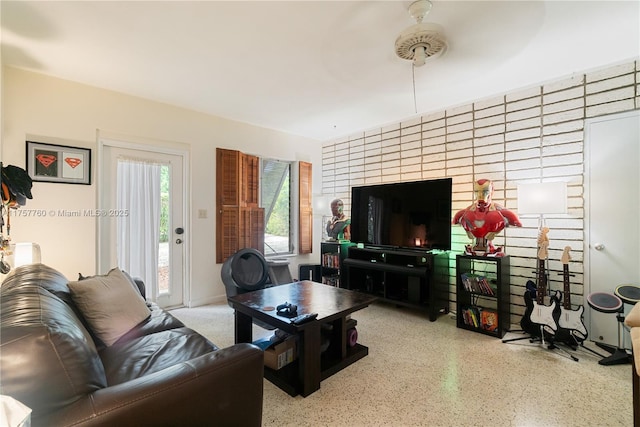 living room with speckled floor