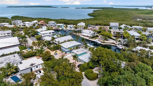 aerial view with a water view and a residential view