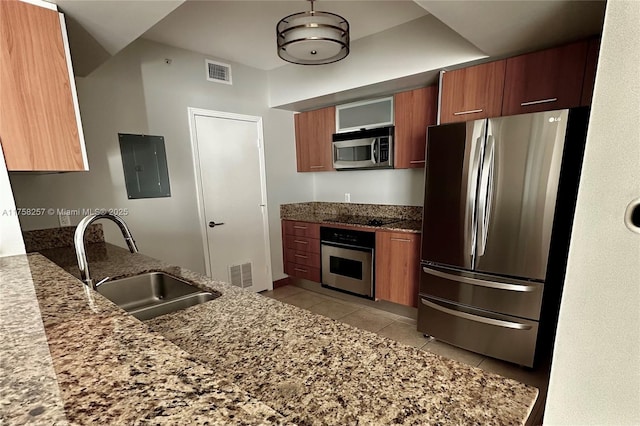 kitchen with light tile patterned floors, visible vents, appliances with stainless steel finishes, a sink, and electric panel