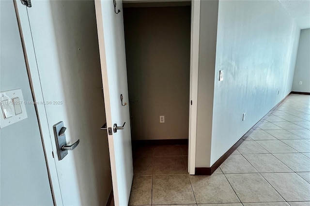 9066 SW 73rd Ct Unit 1210, Pinecrest, FL 33156 - hall with light tile patterned floors and baseboards