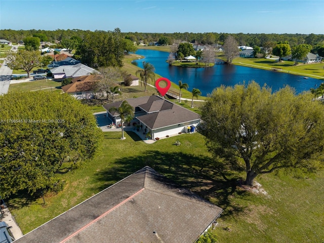 bird's eye view with a water view