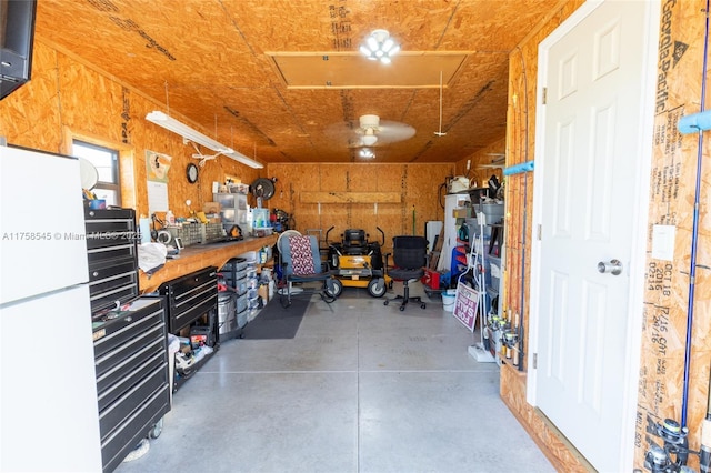 garage with a workshop area