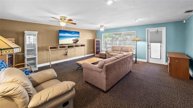 living area featuring a ceiling fan, carpet flooring, visible vents, and baseboards