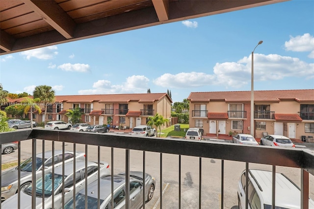 balcony featuring a residential view