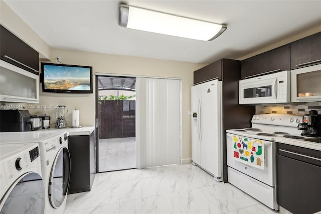 kitchen featuring washing machine and dryer, white appliances, light countertops, and marble finish floor