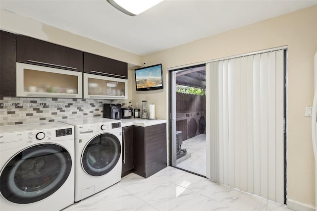 laundry area with marble finish floor, laundry area, and independent washer and dryer