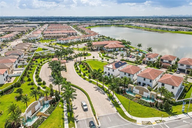 aerial view featuring a water view and a residential view