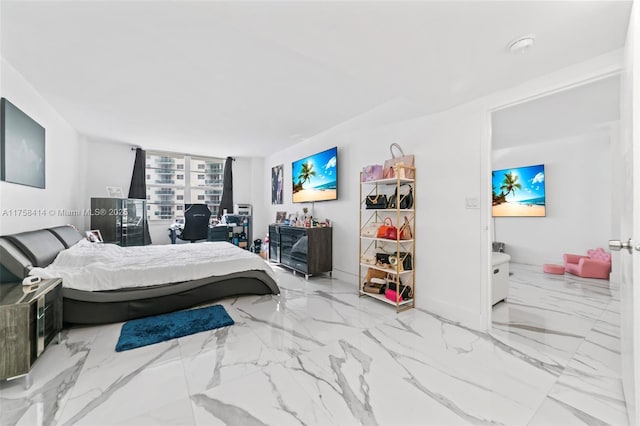 bedroom with marble finish floor