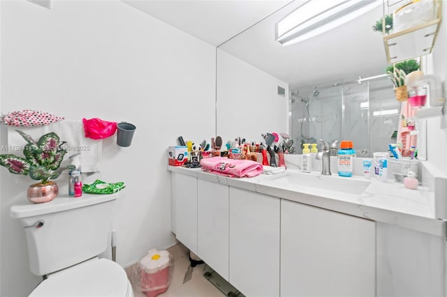 full bath with toilet, a stall shower, and vanity
