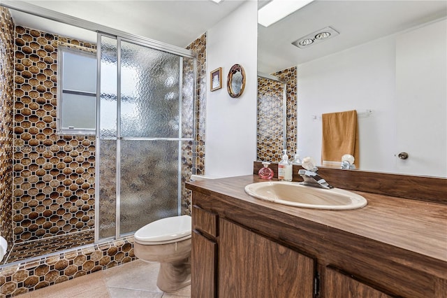 full bathroom with toilet, a shower stall, and vanity