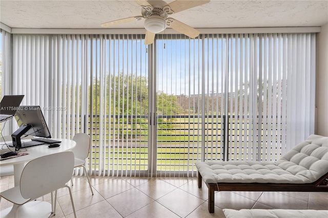 sunroom with ceiling fan