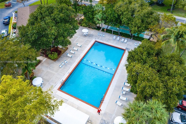 community pool featuring a patio area