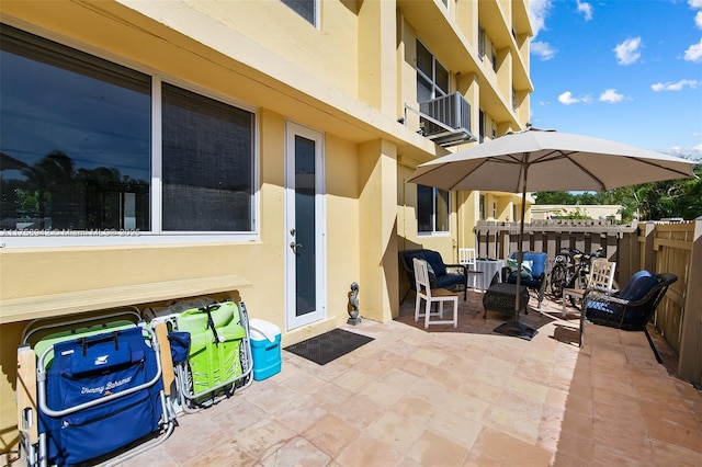 view of patio / terrace with a balcony