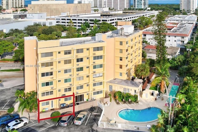 birds eye view of property with a city view