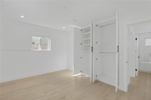 1116 N 31st Ave, Hollywood, FL 33021 - unfurnished bedroom with light wood-style flooring, a closet, and recessed lighting