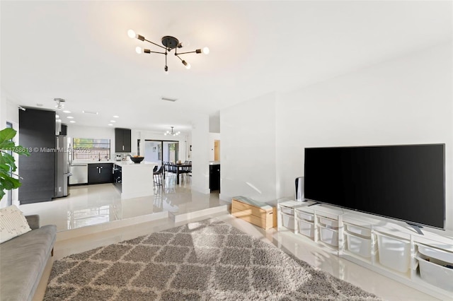 living area with a chandelier