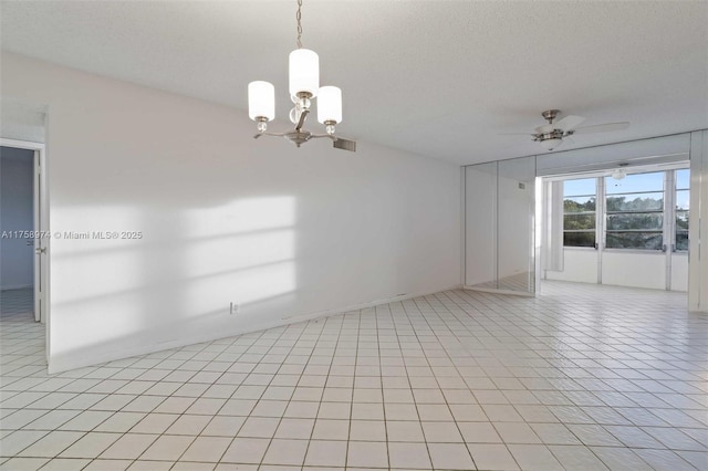 330 NE 26th Ave Unit 4160, Boynton Beach, FL 33435 - spare room featuring visible vents and ceiling fan with notable chandelier