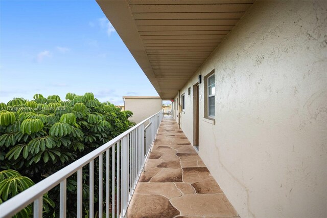 330 NE 26th Ave Unit 4160, Boynton Beach, FL 33435 - spare room featuring a chandelier, ceiling fan, light tile patterned floors, and a textured ceiling