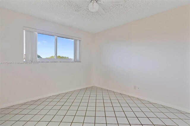 330 NE 26th Ave Unit 4160, Boynton Beach, FL 33435 - spare room featuring a ceiling fan and a textured ceiling