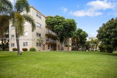 surrounding community featuring a lawn