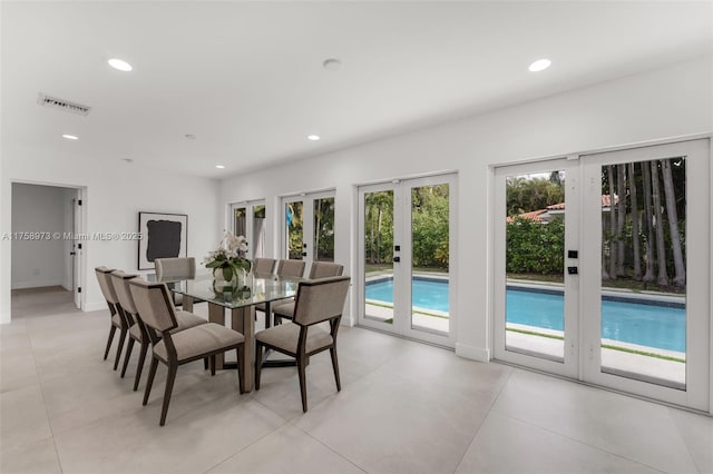 dining area featuring visible vents, recessed lighting, french doors, and baseboards