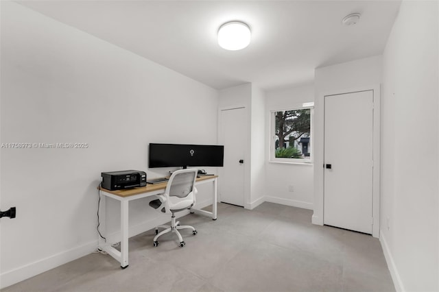 office featuring baseboards