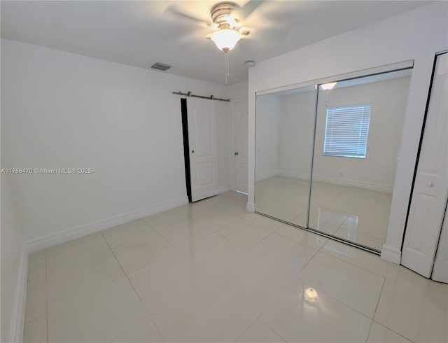 755 NE 88th St, Miami, FL 33138 - unfurnished bedroom featuring tile patterned floors, visible vents, and baseboards