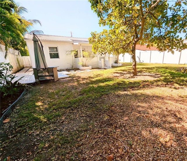 755 NE 88th St, Miami, FL 33138 - view of yard with a fenced backyard