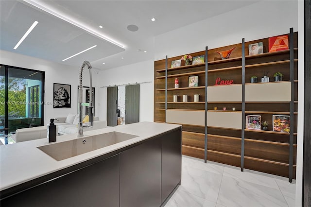 interior space featuring marble finish floor and vanity