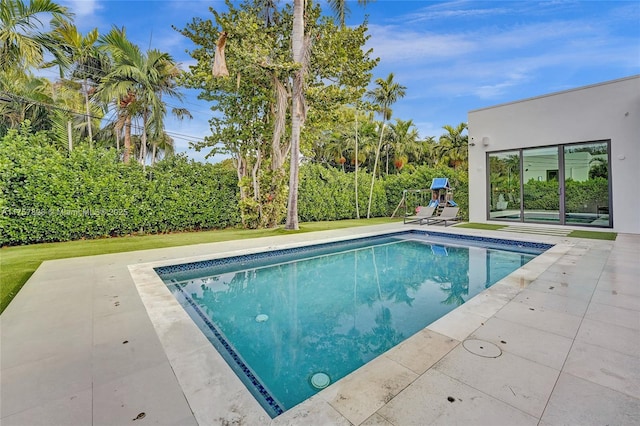 pool featuring a patio area