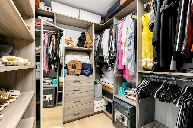 walk in closet featuring light wood-type flooring