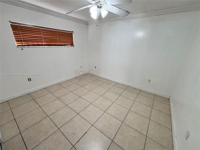 unfurnished room with baseboards, ceiling fan, and ornamental molding