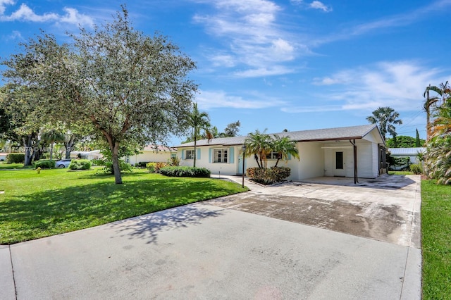 ranch-style house with driveway and a front yard