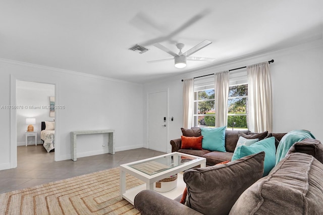 tiled living room with ceiling fan, baseboards, visible vents, and crown molding