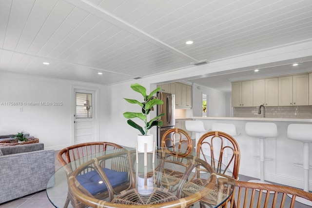 dining area featuring recessed lighting, visible vents, and light tile patterned floors