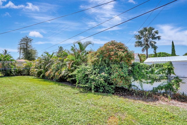 view of yard featuring fence