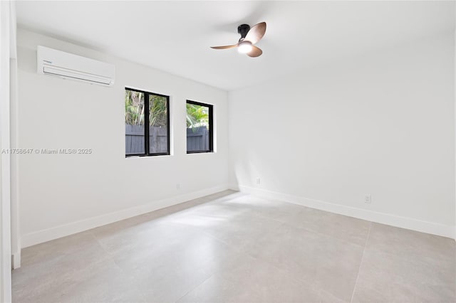 unfurnished room featuring ceiling fan, baseboards, and an AC wall unit